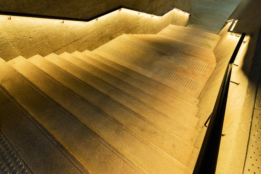 illuminated old stairway in the dark